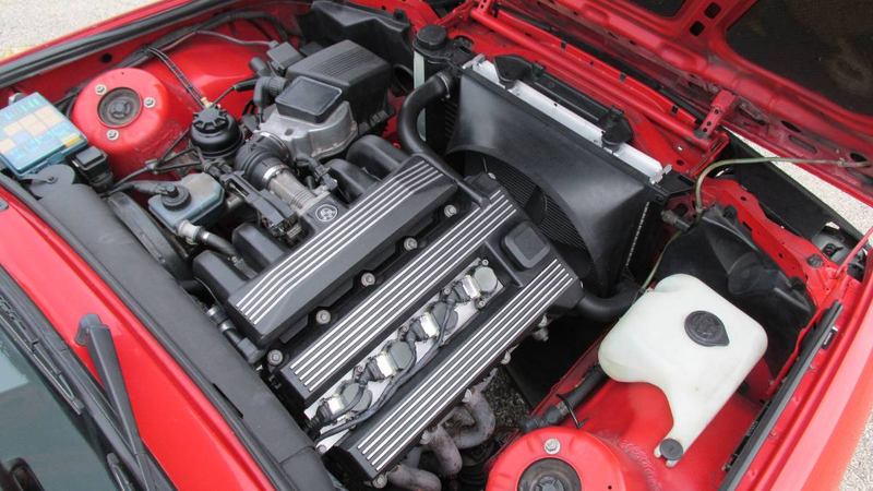 Illustration for article titled At $12,000, Could This Rehabilitated 1991 BMW 318is Restore Your Faith?